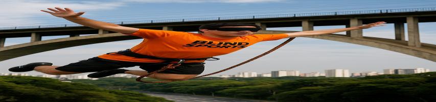 Esporte radical em São Paulo

Homem pulando de uma ponte com uma corda de segurança, praticando um esporte radical, provavelmente bungee jump. Ele está vendado, usando uma camiseta laranja com as palavras "BLIND SPORTS" e shorts pretos. Ao fundo, é possível ver uma avenida cercada por árvores, prédios altos e o céu azul claro. A ponte de concreto aparece em evidência acima dele.